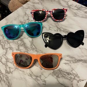 4 pairs of sunglasses